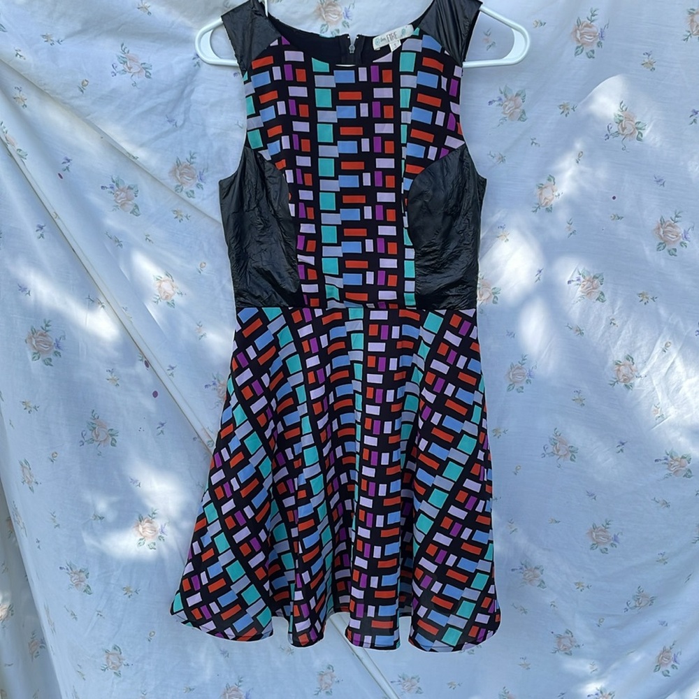 Black dress with geometric shapes